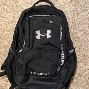 Black backpack fits laptop
